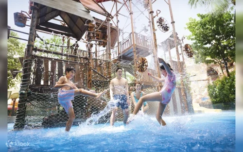 Plunging down the high-speed Dueling Racer water slide in Sentosa.