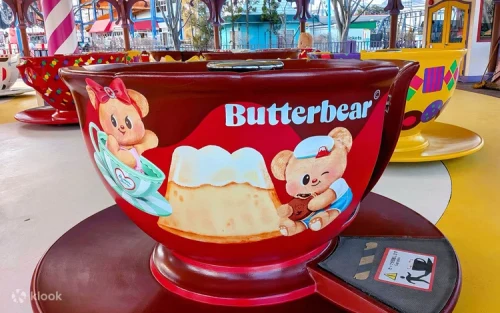 Families enjoying gentle rides at the colorful Thomas Land area
