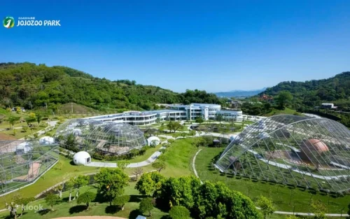 Massive aviary cages resembling a Jurassic Park movie scene