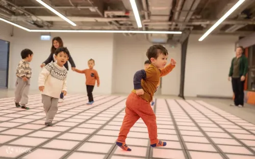 Colorful interactive edutainment zones fostering creativity and physical activity