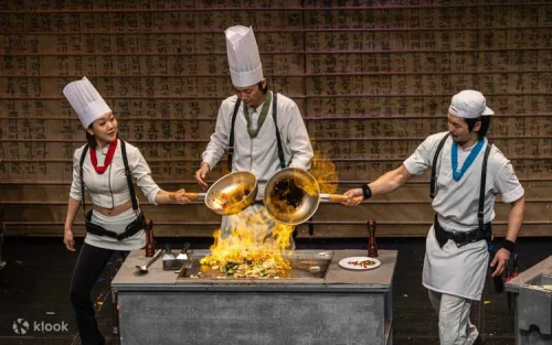 Four talented cooks performing traditional Korean Samulnori rhythms