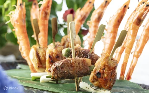 Chefs preparing authentic Japanese cuisine at live cooking stations