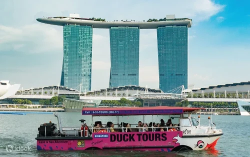 Amphibious war craft cruising past the iconic Marina Bay Sands