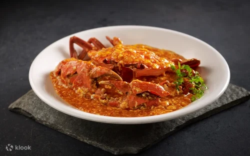 Delicious Singapore Chilli Crab and seafood feast served after the river cruise