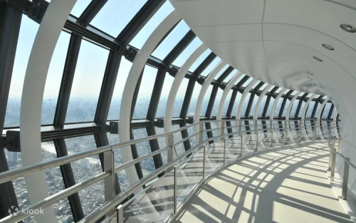 Clear daytime view of Mount Fuji rising on the horizon from the observation deck