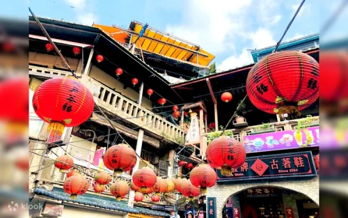 Travelers releasing colorful painted sky lanterns on the railway tracks at Shifen Old Street