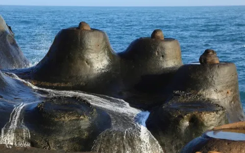 Scenic coastal views of the Datun Mountain extending into the sea
