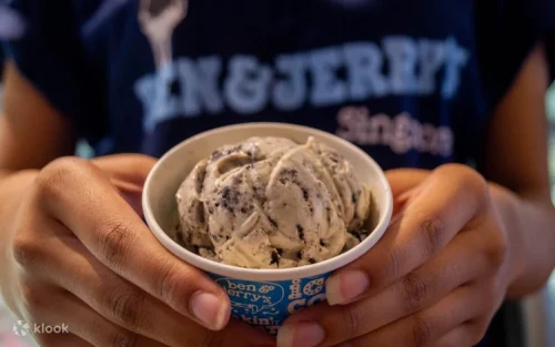 A colorful selection of chunky and swirly Ben & Jerry's ice cream flavors.