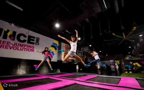 Jumpers flying high at the interconnected Free Jump Arena in Singapore.
