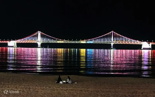 Illuminated Gwangandaegyo Bridge viewed from Gwangalli Beach at night