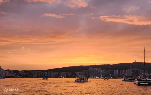Passengers enjoying a romantic sunset cruise in South Korea