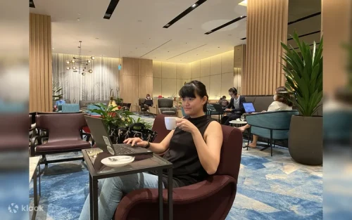 Comfortable seating area with modern decor at the airport lounge