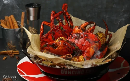 Freshly prepared signature Chilli Crab with bold spices