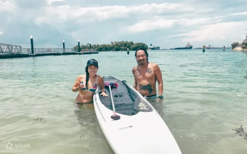 High-speed donut tube ride splashing through the tropical waves
