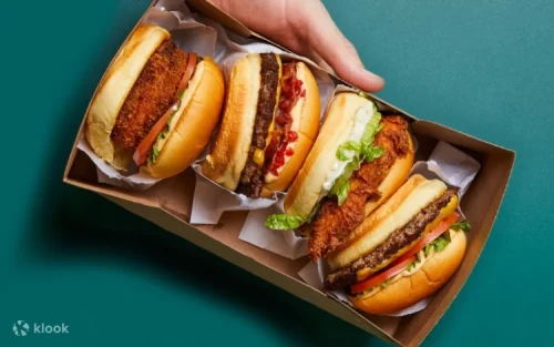 Crispy crinkle cut fries topped with melted cheese at Shake Shack