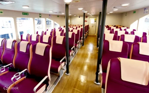 Passengers enjoying the scenic ocean ride departing from Singapore