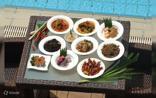 Signature Ayam Buah Keluak dish served in a traditional claypot