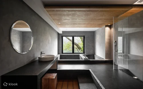 Modern private hot spring bath with stunning mountain views in Wulai