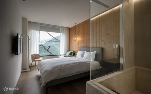 Beautiful sunrise seen through large picture windows in New Taipei City