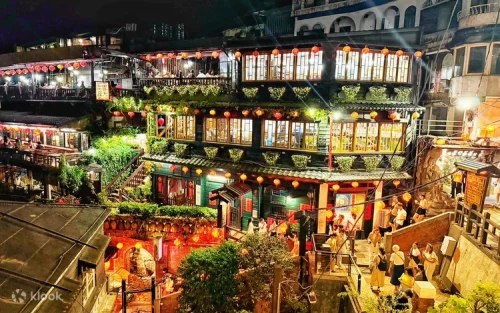 Releasing traditional sky lanterns on the Shifen Old Street railway