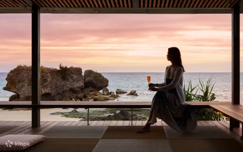 Dramatic limestone cliffs and turquoise ocean waters at scenic Cape Manza