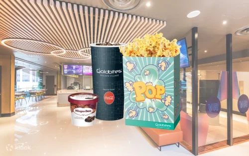 Freshly popped buttery popcorn at a cinema concession stand