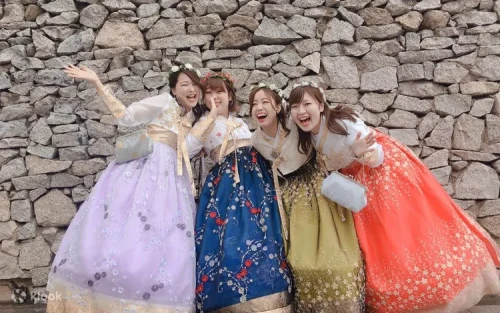 Couple exploring Changdeokgung Palace in matching premium Hanbok attire