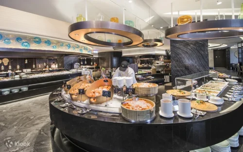 Decadent dessert table featuring cakes and artisanal pastries