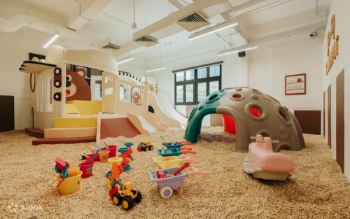 Toddlers enjoying premium soft play obstacles at Kiztopia