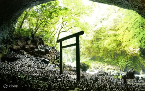 Thousands of stacked prayer stones inside the Ama-no-Yasugawara cave