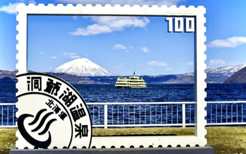 Majestic Mount Yotei reflecting on the peaceful surface of Lake Toya