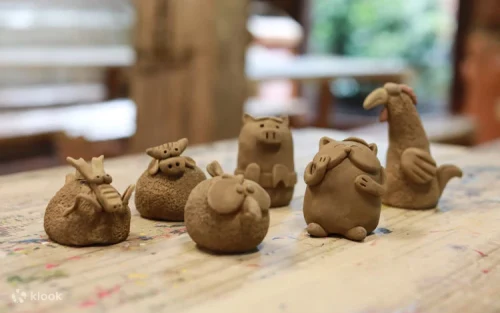 Families and kids wearing work uniforms for fun parent-child clay kneading