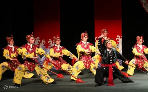 Dynamic traditional drum, lion, and dragon dance performance on stage.