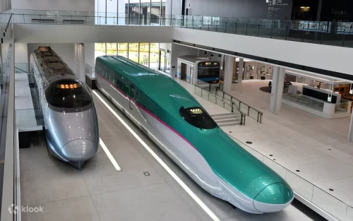 Panoramic views of passing Shinkansen from the rooftop observatory