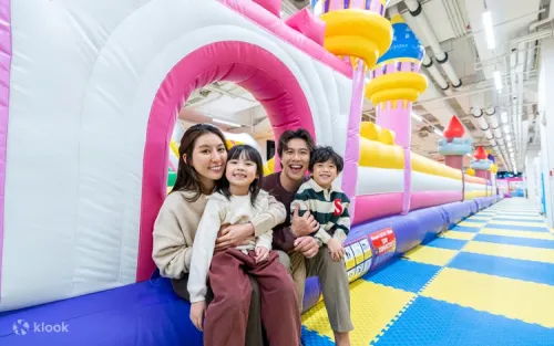 Children playing in the massive 30,000-ball pit at Bouncetopia