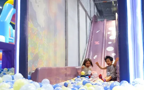 Kids engaging in creative role-play rooms to build social skills