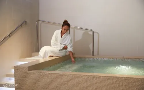 Luxurious spa treatment room prepared for an organic invigorating massage