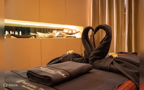 Therapist performing authentic Thai aromatherapy oil massage