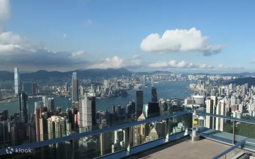 Visitors enjoying the lively atmosphere and attractions at The Peak Tower.