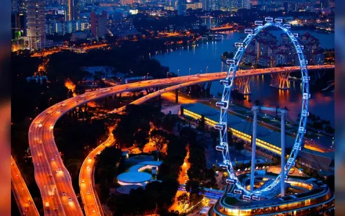 Illuminated Singapore Flyer observation wheel at night