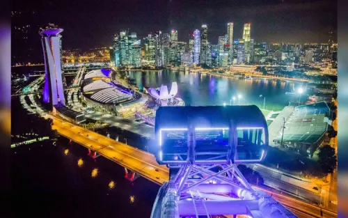Spacious glass capsule overlooking the Marina Bay skyline