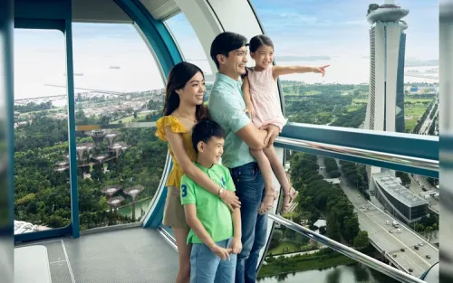 Guests enjoying 165 Sky Dining inside a private capsule
