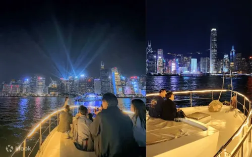Sea butler taking professional photos of passengers against the city lights