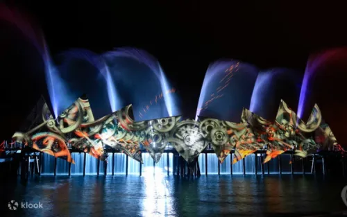 Dazzling state-of-the-art laser lights illuminating the open sea in Sentosa.