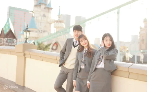 Couple taking romantic photos in a Korean school uniform studio