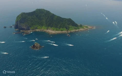 Hikers walking along the mountain ridge trails of Keelung Island