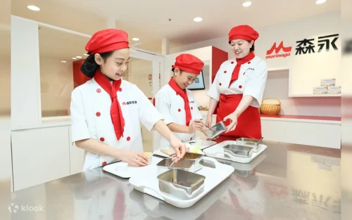 Kids earning and spending kidZos currency at the mini bank