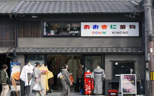Elegant yukata and kimono designs displayed in a spacious Kyoto boutique