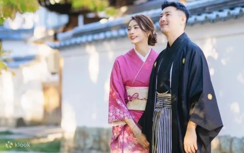 Traveler wearing a beautiful traditional kimono exploring Gion streets