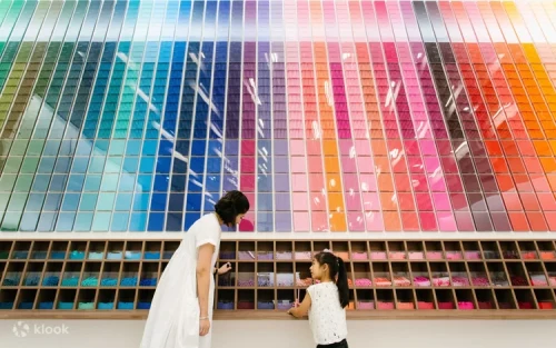 Famous 60-color gradient check-in wall at the Imagination Factory